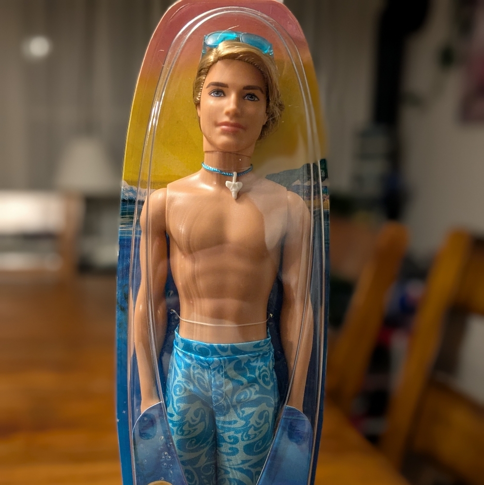 Ken from Barbie in a Mermaid Tale circa 2012.  This is 23 years old, new in box